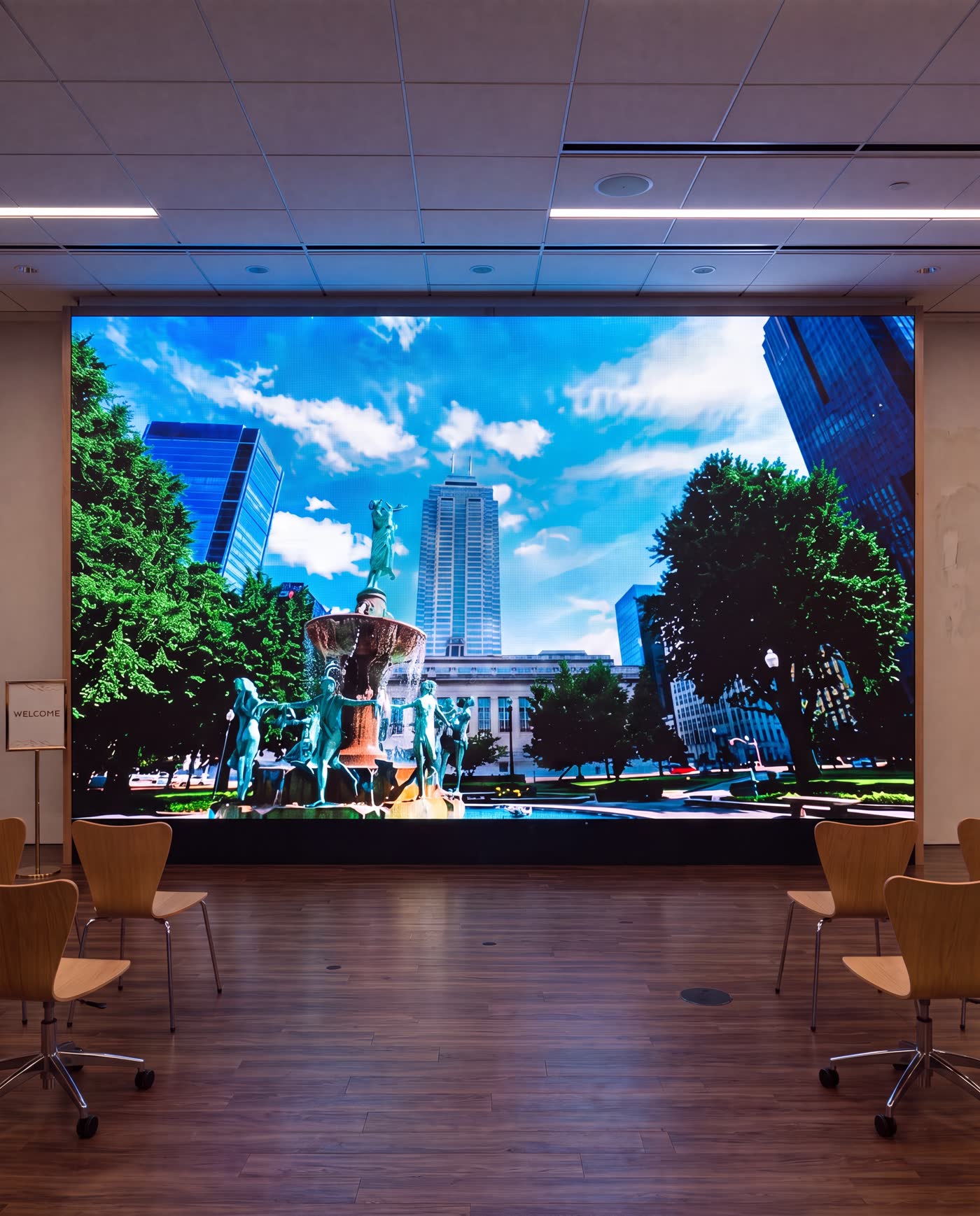 LED video wall across the end of a corporate event room